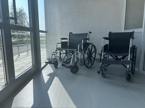 <div>Wheelchairs for moving passengers around the airport</div>